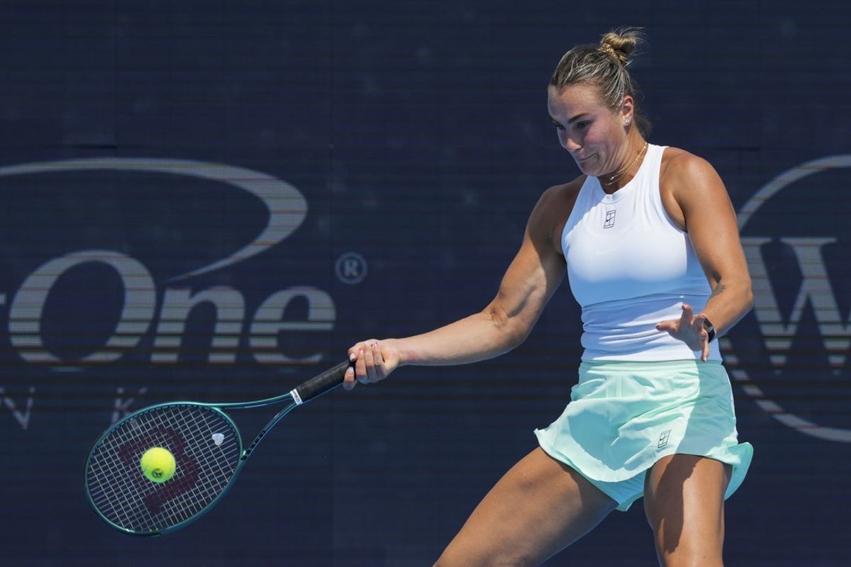 Aug 15, 2025; Cincinnati, OH, USA;  Aryna Sabalenka (BLR) returns a shot against Elena Rybakina (KAZ) during the Cincinnati Open at the Lindner Family Tennis Center. Mandatory Credit: Aaron Doster-Imagn Images