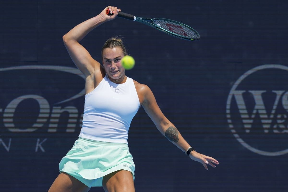 Aug 15, 2025; Cincinnati, OH, USA;  Aryna Sabalenka (BLR) returns a shot against Elena Rybakina (KAZ) during the Cincinnati Open at the Lindner Family Tennis Center. Mandatory Credit: Aaron Doster-Imagn Images