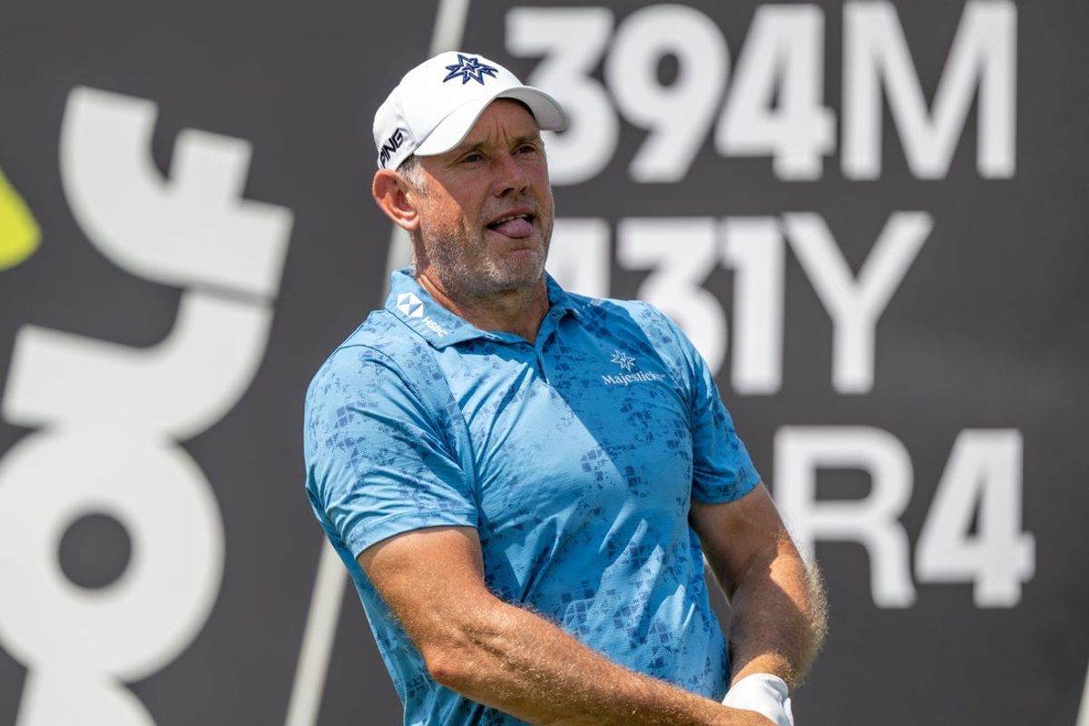Aug 15, 2025; Indianapolis, IN, United States; Lee Westwood of Majesticks GC reacts to his tee shot on the 6th hole during the first round of LIV Golf Indianapolis. Mandatory Credit: Marc Lebryk-Imagn Images