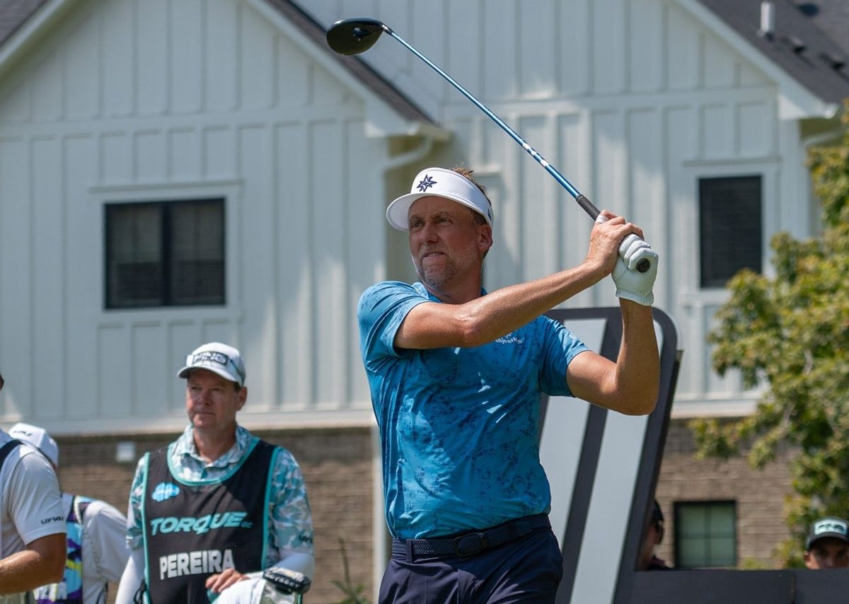 Ian Poulter tees off on the ninth hole Friday, Aug. 15, 2025, during day one of the LIV Golf Indianapolis tournament held at The Club at Chatham Hills in Westfield, Indiana.