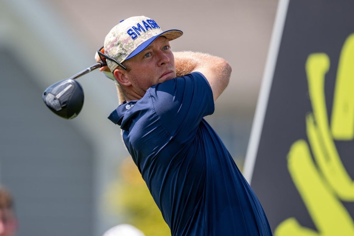 Aug 15, 2025; Indianapolis, IN, United States; Talor Gooch of Smash GC tees off on the 6th hole during the first round of LIV Golf Indianapolis. Mandatory Credit: Marc Lebryk-Imagn Images