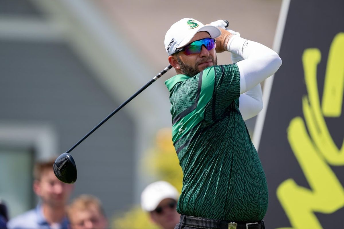 Aug 15, 2025; Indianapolis, IN, United States; Dean Burmester of Stinger GC tees off on the 6th hole during the first round of LIV Golf Indianapolis. Mandatory Credit: Marc Lebryk-Imagn Images