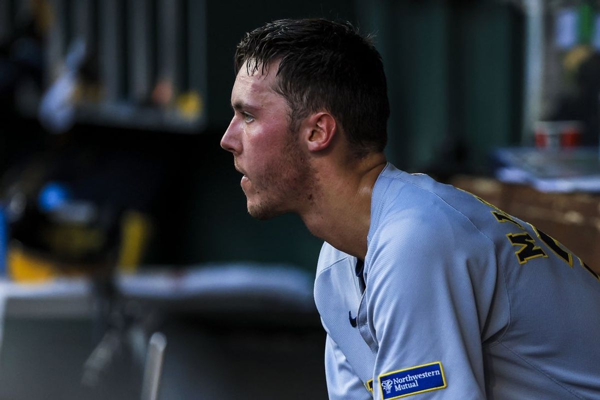 Aug 15, 2025; Cincinnati, Ohio, USA; Milwaukee Brewers starting pitcher Jacob Misiorowski (32) sits in the dugout during a pitching change in the second inning against the Cincinnati Reds at Great American Ball Park. Mandatory Credit: Katie Stratman-Imagn Images
