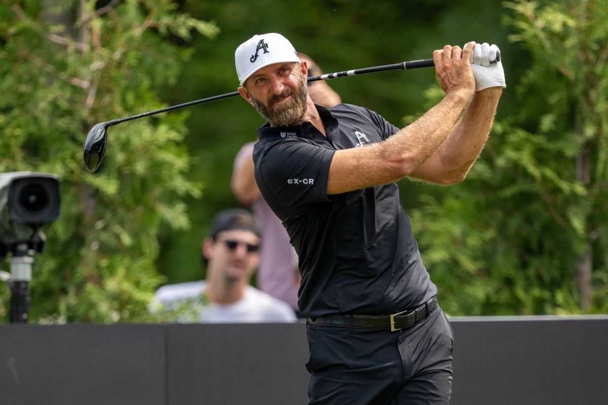Aug 16, 2025; Indianapolis, IN, United States; Dustin Johnson of 4Aces GC tees off on the 4th hole during the second round of LIV Golf Indianapolis. Mandatory Credit: Marc Lebryk-Imagn Images
