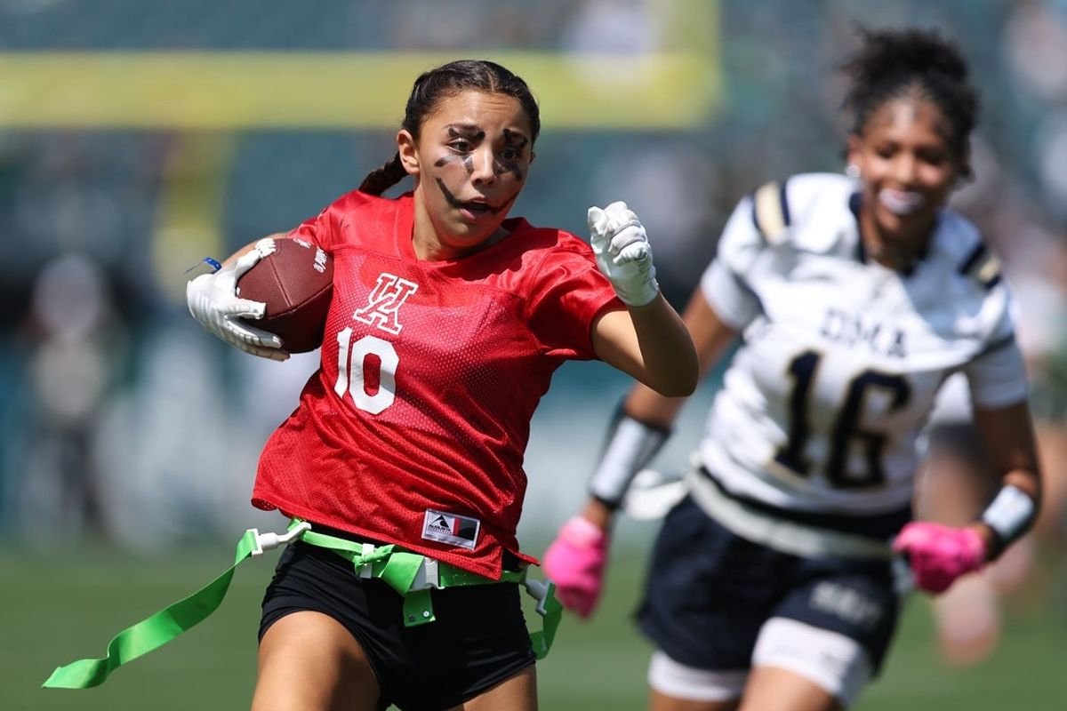 Aug 16, 2025; Philadelphia, Pennsylvania, USA; Delaware Women’s flag football teams compete during halftime of a game between the Philadelphia Eagles and the Cleveland Browns at Lincoln Financial Field. Mandatory Credit: Bill Streicher-Imagn Images