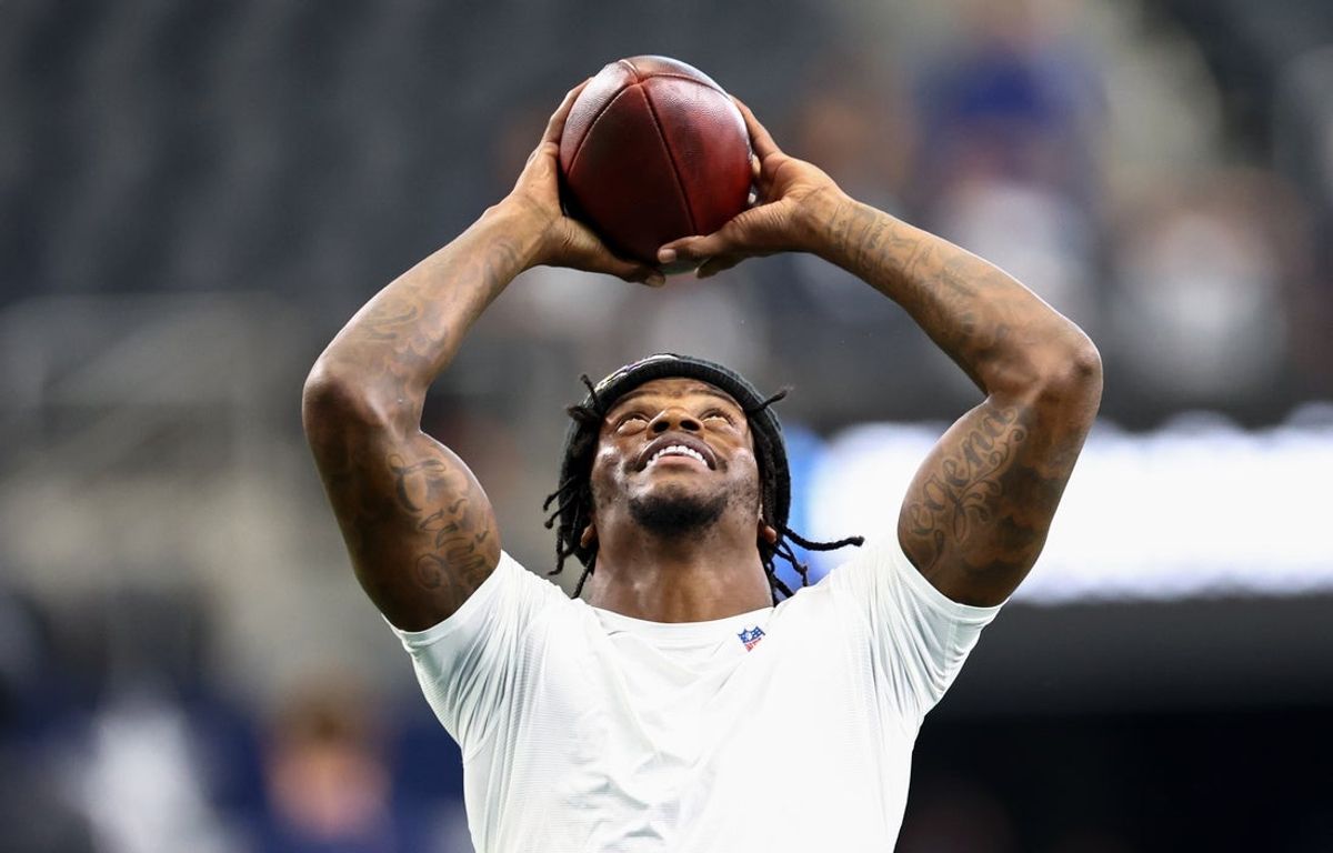 Aug 16, 2025; Arlington, Texas, USA;  Baltimore Ravens quarterback Lamar Jackson (8) warms up before the game against the Dallas Cowboys at AT&T Stadium. Mandatory Credit: Kevin Jairaj-Imagn Images