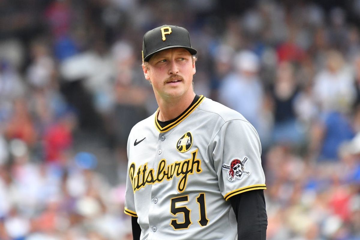 Aug 16, 2025; Chicago, Illinois, USA; Pittsburgh Pirates pitcher Evan Sisk (51) reacts after being relieved during the eighth inning against the Chicago Cubs at Wrigley Field. Mandatory Credit: Patrick Gorski-Imagn Images