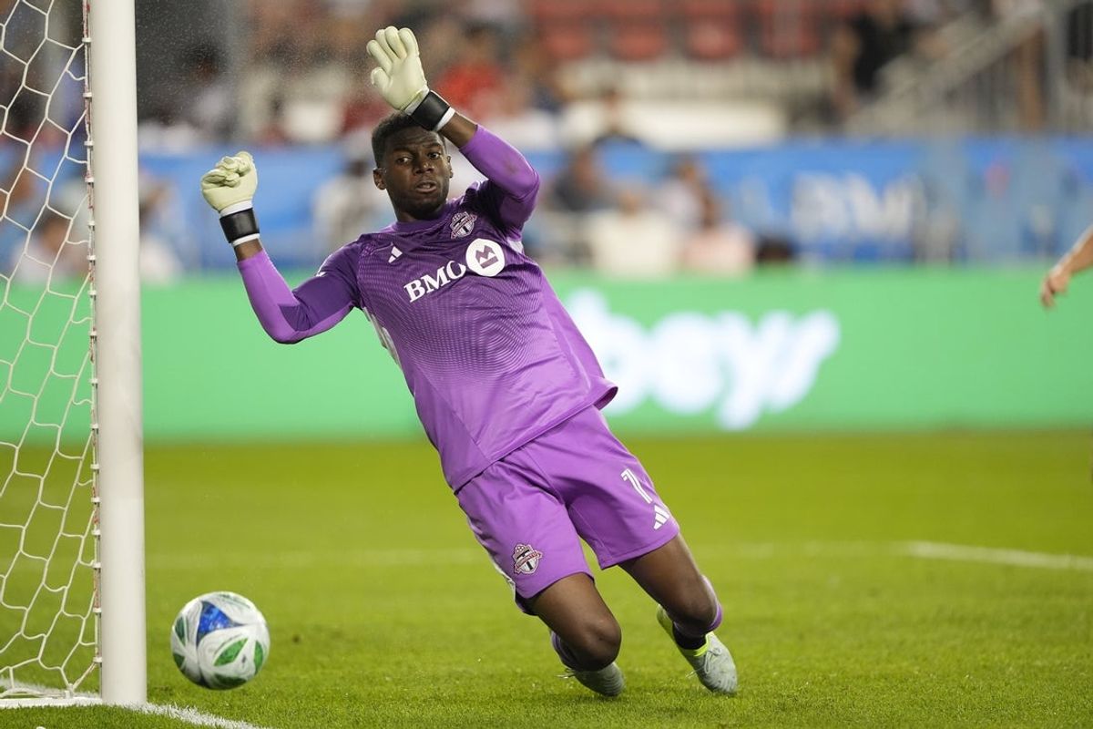 Aug 16, 2025; Toronto, Ontario, CAN; Toronto FC goalkeeper Sean Johnson (1) watches a rebound of a Columbus Crew shot go wide of the net during the second half at BMO Field. Mandatory Credit: John E. Sokolowski-Imagn Images