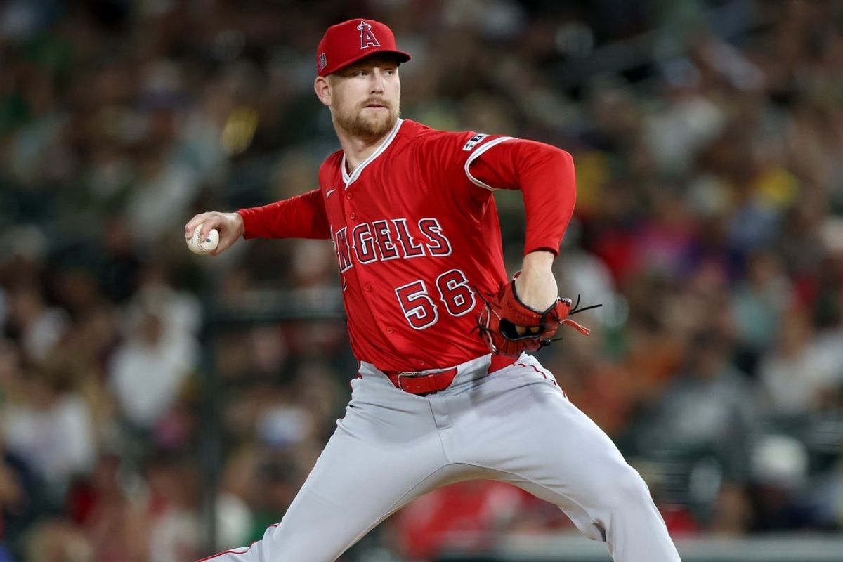 Aug 16, 2025; West Sacramento, California, USA; Los Angeles Angels pitcher Ryan Zeferjahn (56) throws a pitch against the Athletics during the fifth inning at Sutter Health Park. Mandatory Credit: Dennis Lee-Imagn Images