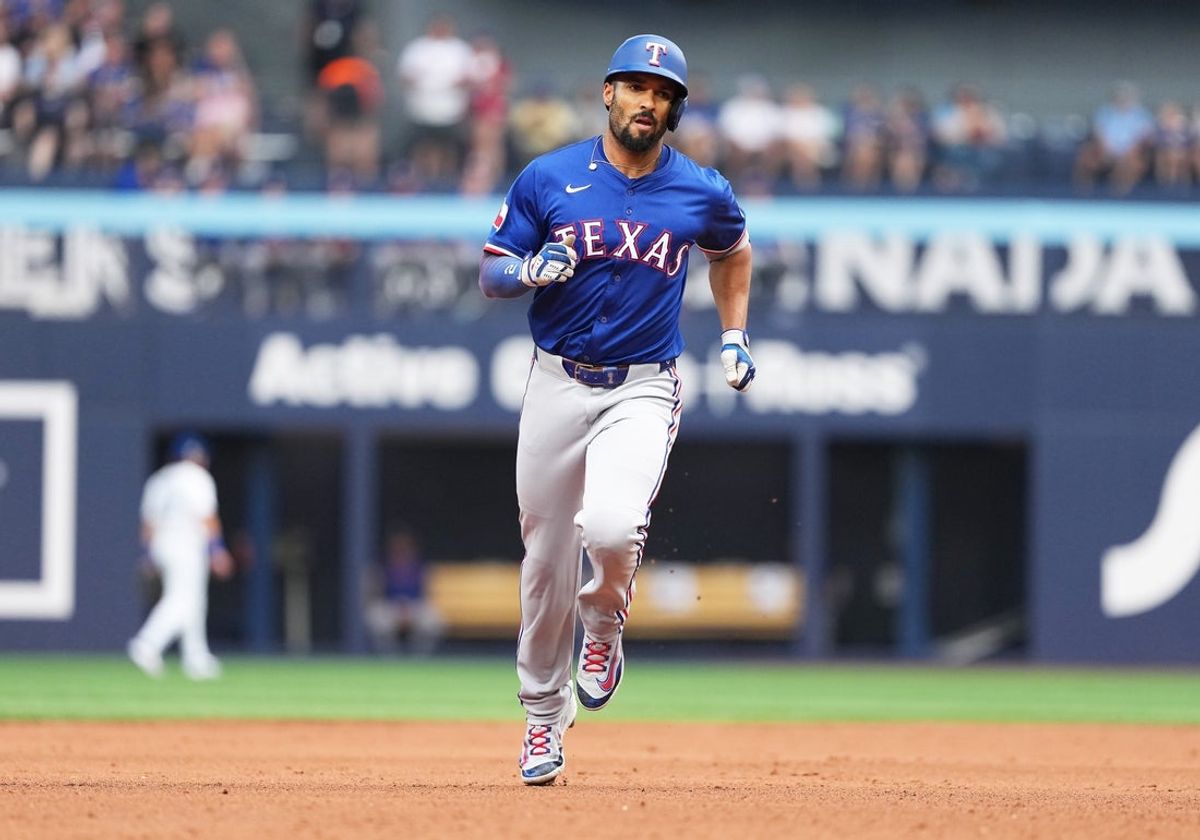 Aug 17, 2025; Toronto, Ontario, CAN; Texas Rangers second baseman Marcus Semien (2) runs the bases after hitting a two run home run against the Toronto Blue Jays during the second inning at Rogers Centre. Mandatory Credit: Nick Turchiaro-Imagn Images