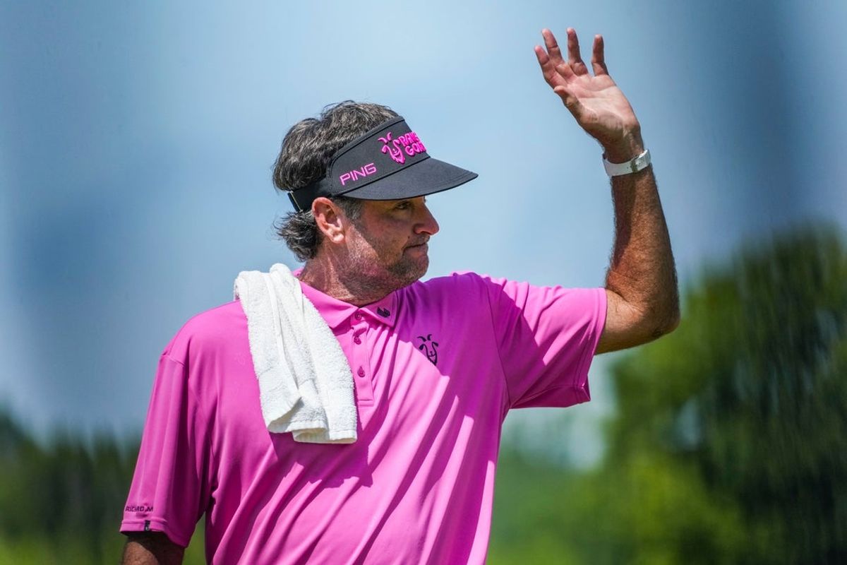 Bubba Watson waves to fans on hole 18 green Sunday, Aug. 17, 2025, during day three of LIV Golf Indianapolis at The Club at Chatham Hills in Westfield.