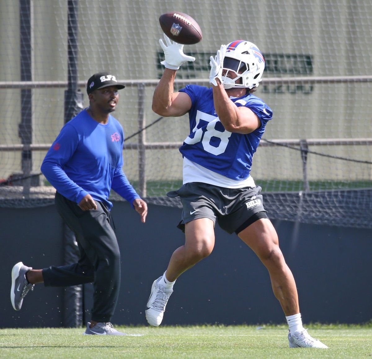Bills linebacker Matt Milano pulls in a pass during interception drills during the second day of Buffalo Bills training camp at St. John Fisher University on Thursday, July 24, 2025, in Pittsford.