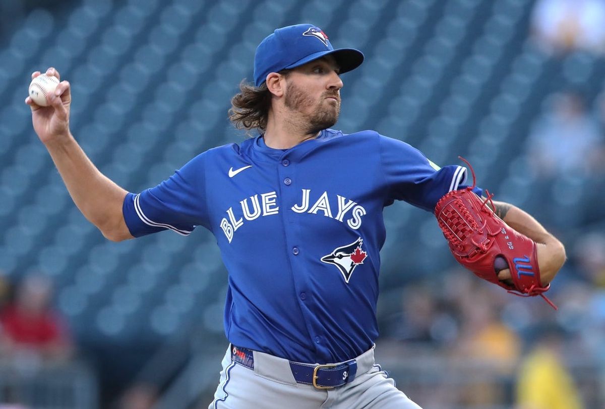 Aug 18, 2025; Pittsburgh, Pennsylvania, USA;  Toronto Blue Jays starting pitcher Kevin Gausman (34) delivers a pitch against the Pittsburgh Pirates during the first inning at PNC Park. Mandatory Credit: Charles LeClaire-Imagn Images