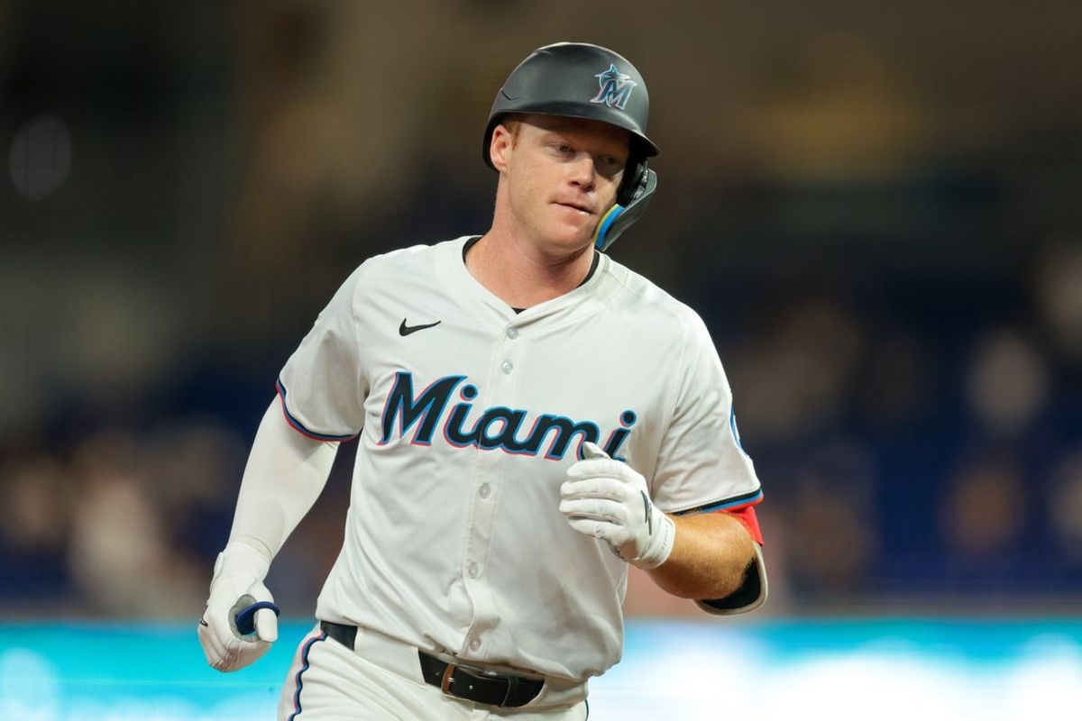Aug 18, 2025; Miami, Florida, USA; Miami Marlins first baseman Eric Wagaman (33) circles the bases after hitting a solo home run against the St. Louis Cardinals during the fourth inning at loanDepot Park. Mandatory Credit: Sam Navarro-Imagn Images