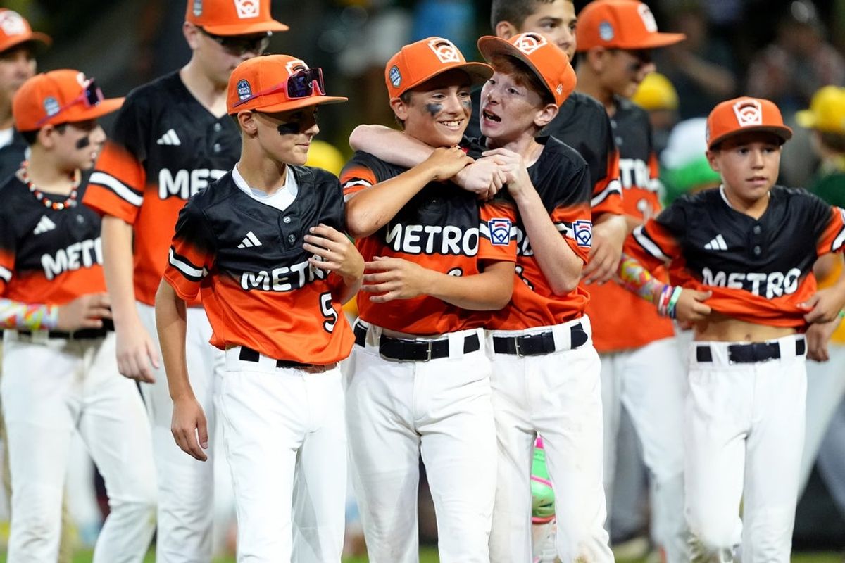 Aug 18, 2025; Williamsport, PA, USA; Luca Pellegrini (6) of Metro Region reacts with Ben Herbst (4) after the game against Midwest Region at Howard J Lamade Stadium. Mandatory Credit: Kyle Ross-Imagn Images