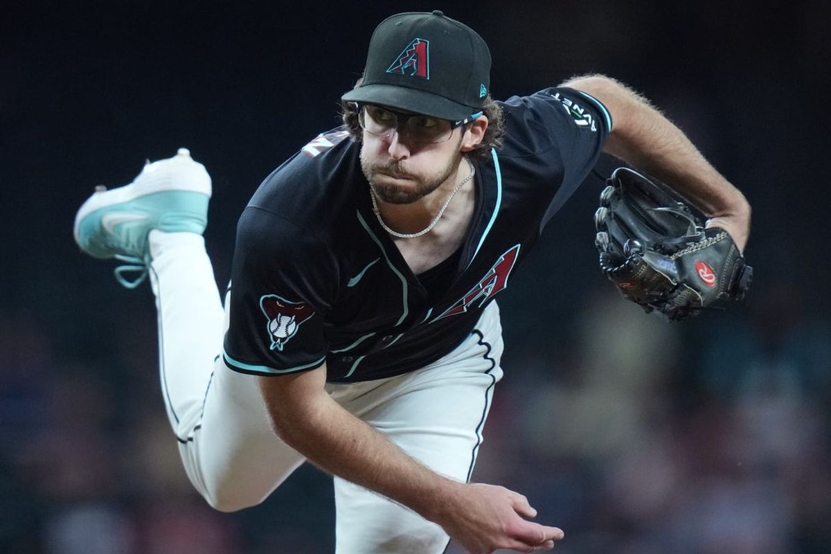 Arizona Diamondbacks right-hander Zac Gallen (23) pitches against the Cleveland Guardians at Chase Field on Aug. 19, 2025.