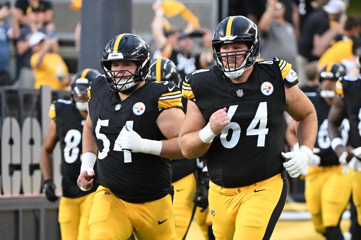 Aug 16, 2025; Pittsburgh, Pennsylvania, USA; Pittsburgh Steelers center Zach Frazier (54) and  guard Max Scharping (64) take the field for a game against the Tampa Bay Buccaneers at Acrisure Stadium. Mandatory Credit: Barry Reeger-Imagn Images