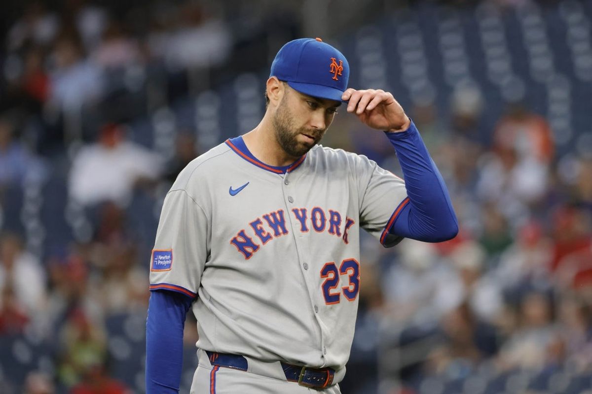 Aug 19, 2025; Washington, District of Columbia, USA; New York Mets starting pitcher David Peterson (23) reacts after the third out against the Washington Nationals during the first inning at Nationals Park. Mandatory Credit: Amber Searls-Imagn Images