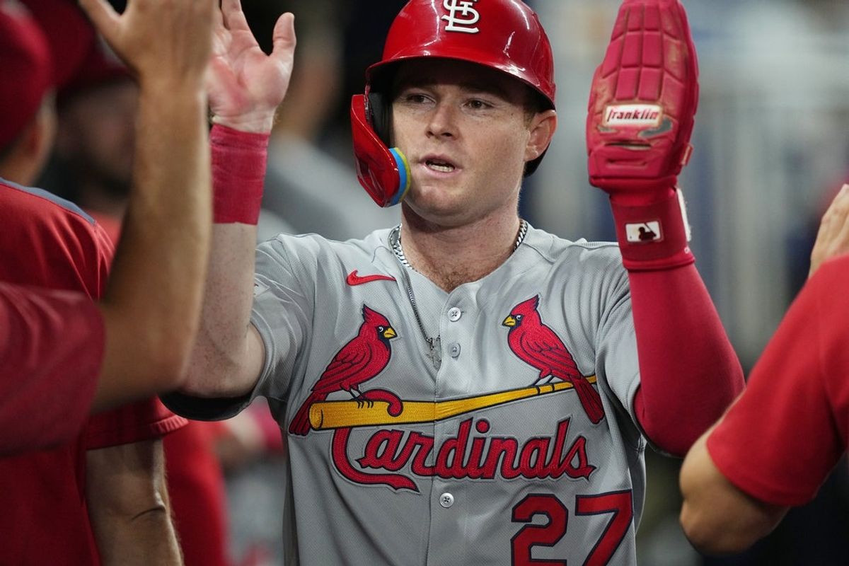 Aug 19, 2025; Miami, Florida, USA;  St. Louis Cardinals center fielder Nathan Church (27) celebrates scoring a run in the second inning against the Miami Marlins at loanDepot Park. Mandatory Credit: Jim Rassol-Imagn Images