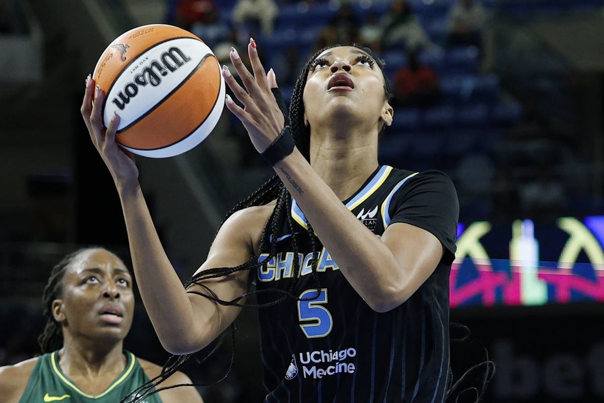 Aug 19, 2025; Chicago, Illinois, USA; Chicago Sky forward Angel Reese (5) drives to the basket against the Seattle Storm during the first half at Wintrust Arena. Mandatory Credit: Kamil Krzaczynski-Imagn Images