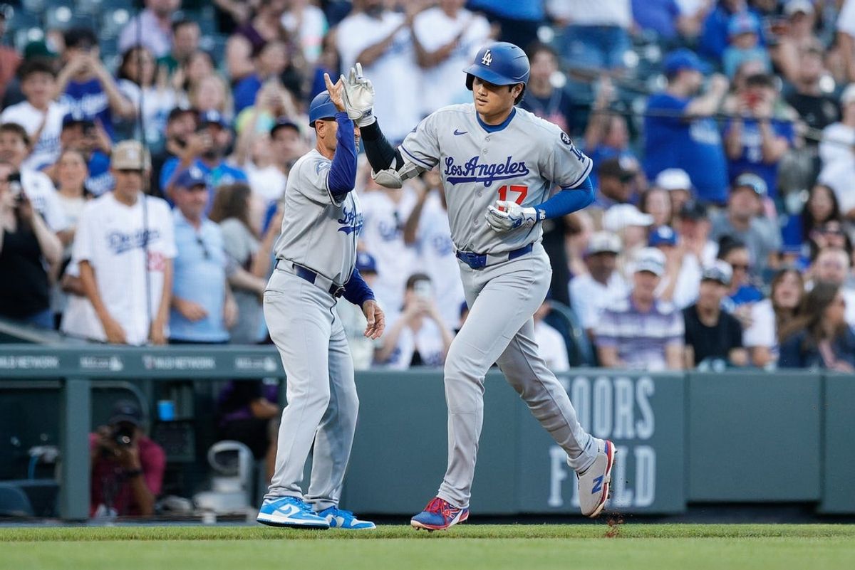 Aug 19, 2025; Denver, Colorado, USA; Los Angeles Dodgers designated hitter Shohei Ohtani (17) rounds the bases on a solo home run in the second inning against the Colorado Rockies at Coors Field. Mandatory Credit: Isaiah J. Downing-Imagn Images