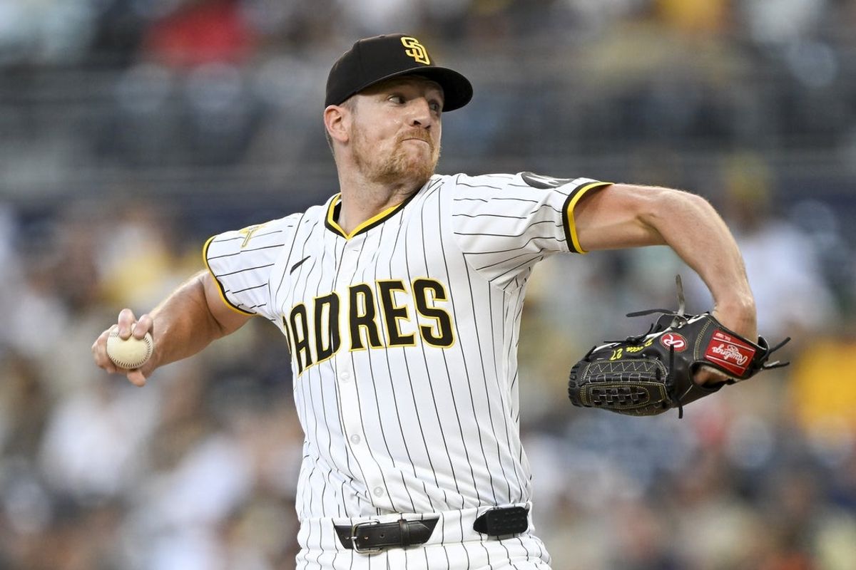 Aug 19, 2025; San Diego, California, USA; San Diego Padres starting pitcher Nick Pivetta (27) delivers during the first inning against the San Francisco Giants at Petco Park. Mandatory Credit: Denis Poroy-Imagn Images