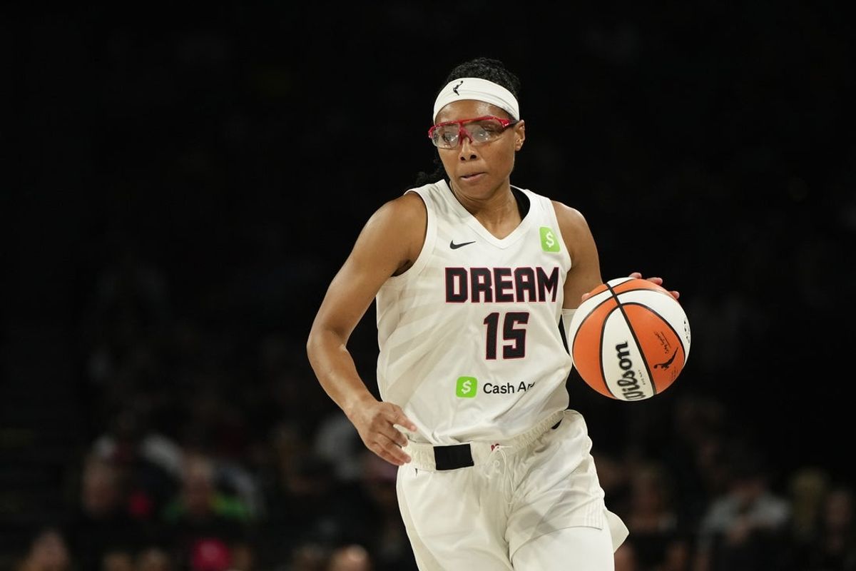 Aug 19, 2025; Las Vegas, Nevada, USA; Atlanta Dream guard Allisha Gray (15) dribbles the ball against the Las Vegas Aces during the second half of a WNBA basketball game at Michelob Ultra Arena. Mandatory Credit: Lucas Peltier-Imagn Images