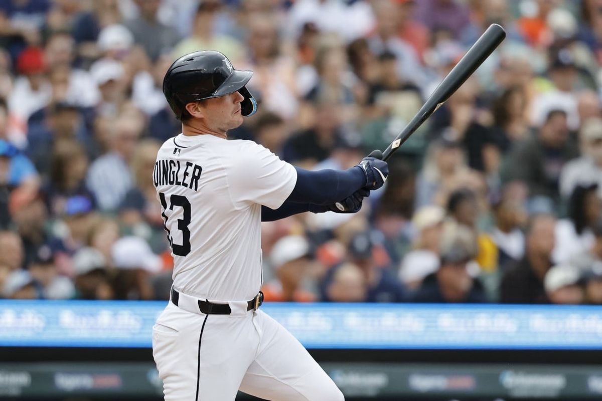 Aug 20, 2025; Detroit, Michigan, USA;  Detroit Tigers designated hitter Dillon Dingler (13) hits an RBI triple in the first inning against the Houston Astros at Comerica Park. Mandatory Credit: Rick Osentoski-Imagn Images