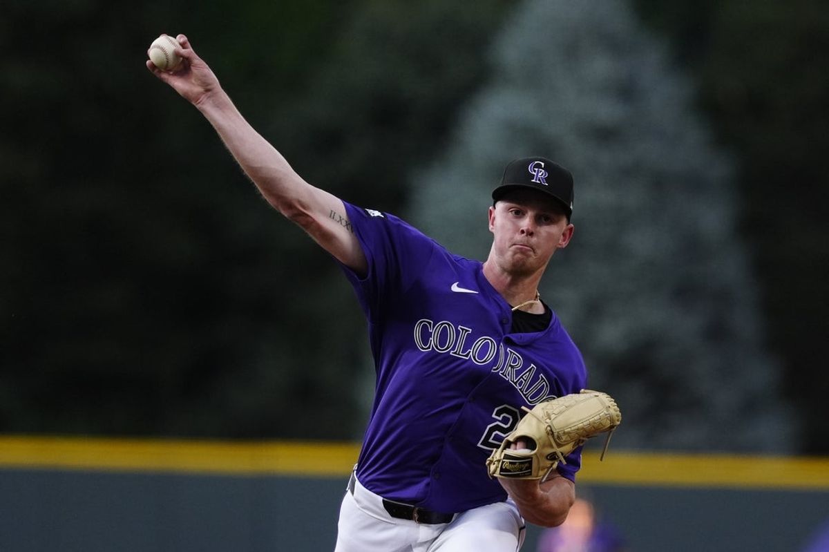 Aug 20, 2025; Denver, Colorado, USA; Colorado Rockies starting pitcher Tanner Gordon (29) delivers a pitch in the first inning against the Los Angeles Dodgers at Coors Field. Mandatory Credit: Ron Chenoy-Imagn Images