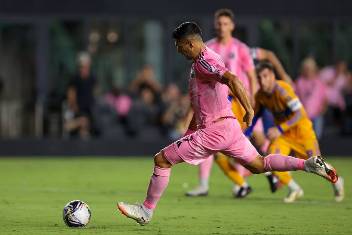 Aug 20, 2025; Fort Lauderdale, Florida, USA; Inter Miami CF forward Luis Suarez (9) scores a penalty against Tigres UANL during the first half at Chase Stadium. Mandatory Credit: Sam Navarro-Imagn Images