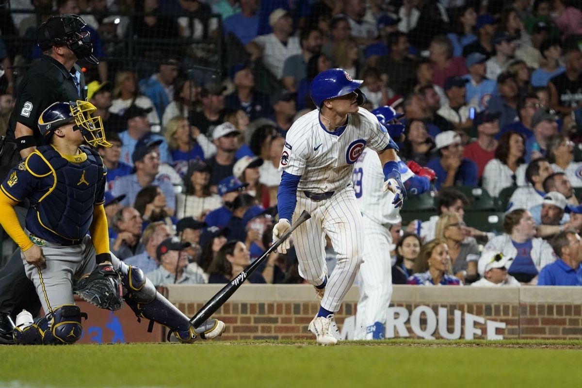 Aug 20, 2025; Chicago, Illinois, USA; Chicago Cubs third base Matt Shaw (6) hits a home run against the Milwaukee Brewers during the eighth inning at Wrigley Field. Mandatory Credit: David Banks-Imagn Images