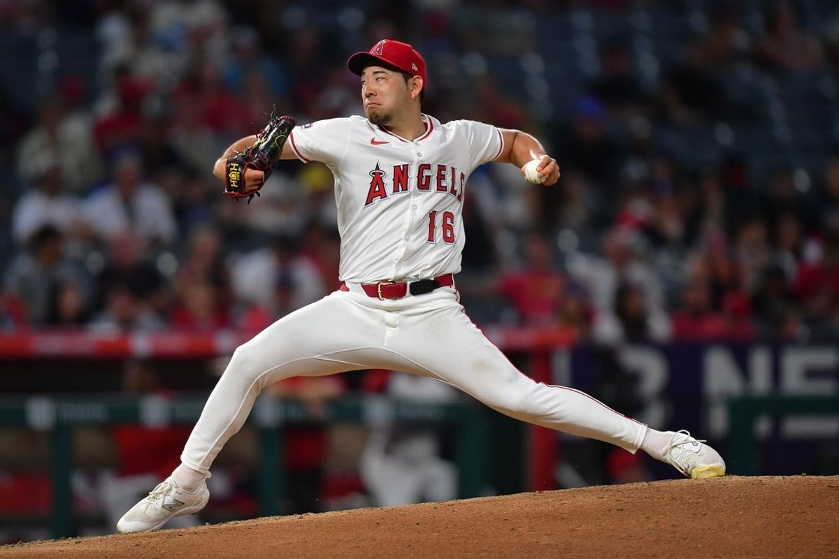 Aug 20, 2025; Anaheim, California, USA; Los Angeles Angels pitcher Yusei Kikuchi (16) throws against the Cincinnati Reds during the fifth inning at Angel Stadium. Mandatory Credit: Gary A. Vasquez-Imagn Images