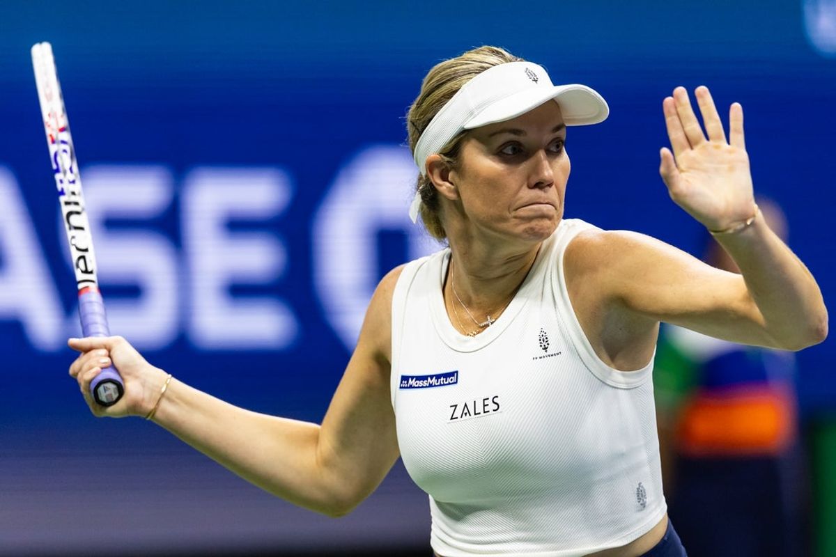 Aug 20, 2025; Flushing, NY, USA; Danielle Collins of the United States and Christian Harrison of the United States in action against Sara Errani of Italy and Andrea Vavassori of Italy in the semi-final of the mixed doubles tournament at the US Open at Arthur Ashe Stadium. Mandatory Credit: Mike Frey-Imagn Images