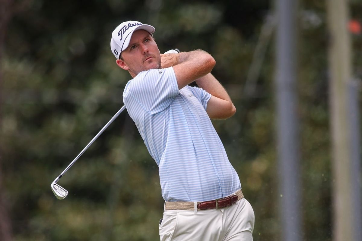 Aug 21, 2025; Atlanta, Georgia, USA; Russell Henley plays his shot from the second tee during the first round of the TOUR Championship golf tournament. Mandatory Credit: Brett Davis-Imagn Images
