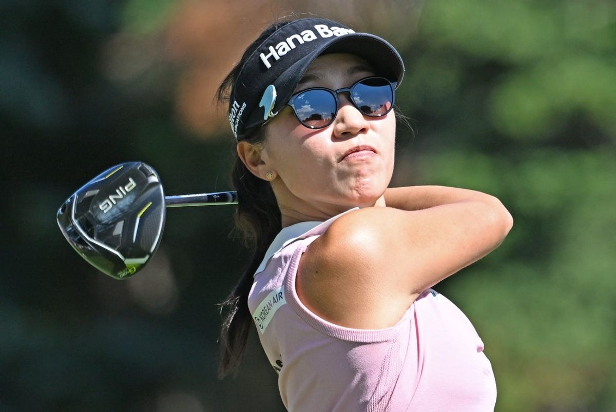 Aug 21, 2025; Mississauga, Ontario, CAN;  Lydia Ko hits her tee shot at the 18th hole during first round play at the CPKC Women's Open golf tournament. Mandatory Credit: Dan Hamilton-Imagn Images