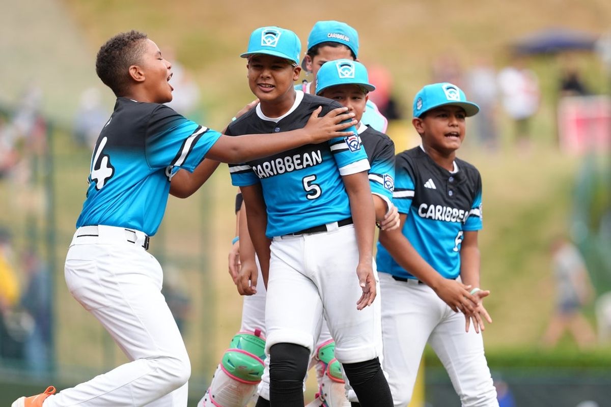 Aug 21, 2025; Williamsport, PA, USA; Emerson Mercado (5) of Caribbean Region reacts with teammates after the game against Latin America Region at Howard J. Lamade Stadium. Mandatory Credit: Kyle Ross-Imagn Images