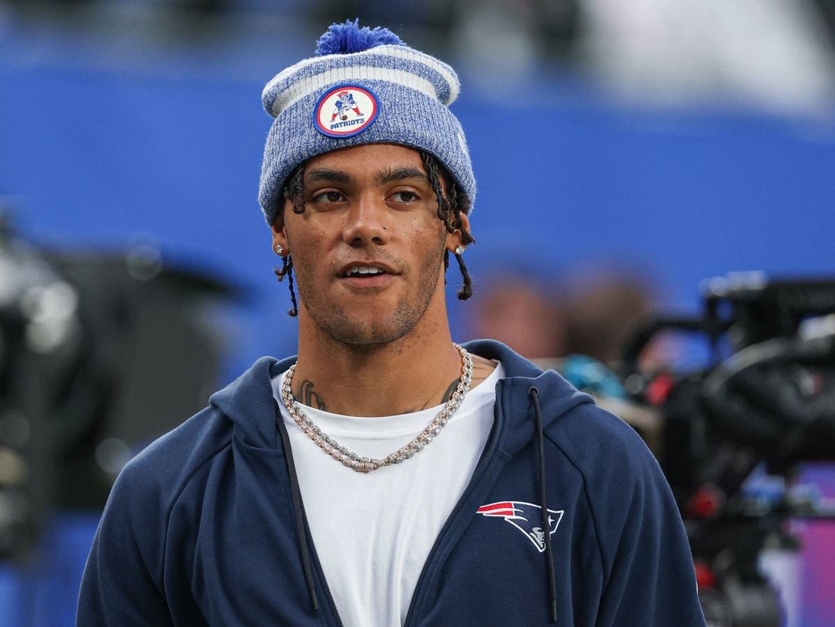 Aug 21, 2025; East Rutherford, New Jersey, USA; New England Patriots cornerback Christian Gonzalez (0) on the field before the preseason game against the New York Giants at MetLife Stadium. Mandatory Credit: Vincent Carchietta-Imagn Images