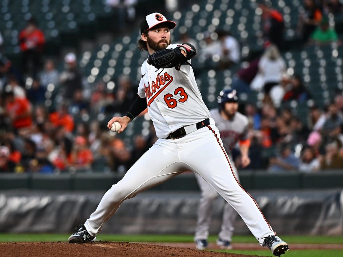 Aug 21, 2025; Baltimore, Maryland, USA;  Baltimore Orioles pitcher Brandon Young (63) delivers a pitch during the second inning against the Houston Astros at Oriole Park at Camden Yards. Mandatory Credit: James A. Pittman-Imagn Images