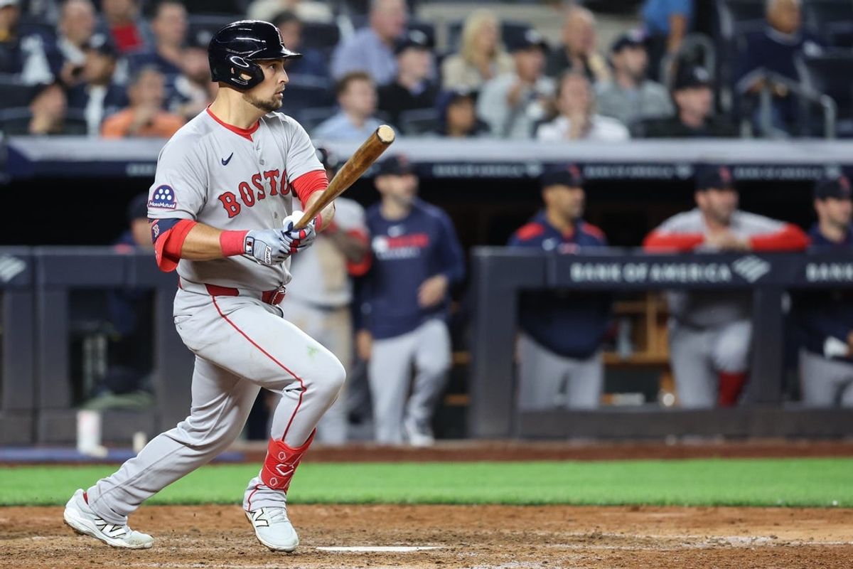 Aug 21, 2025; Bronx, New York, USA;  Boston Red Sox first baseman Nathaniel Lowe (37) hits an RBI double in the seventh inning against the New York Yankees at Yankee Stadium. Mandatory Credit: Wendell Cruz-Imagn Images