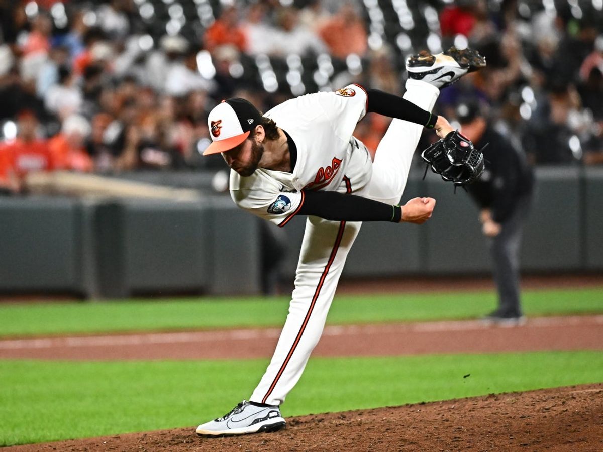 Aug 21, 2025; Baltimore, Maryland, USA;  Baltimore Orioles pitcher Brandon Young (63) delivers a pitch during the fifth inning against the Houston Astros at Oriole Park at Camden Yards. Mandatory Credit: James A. Pittman-Imagn Images