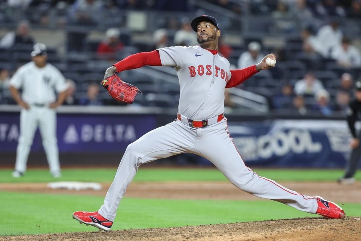 Aug 21, 2025; Bronx, New York, USA;  Boston Red Sox relief pitcher Aroldis Chapman (44) pitches in the ninth inning against the New York Yankees at Yankee Stadium. Mandatory Credit: Wendell Cruz-Imagn Images