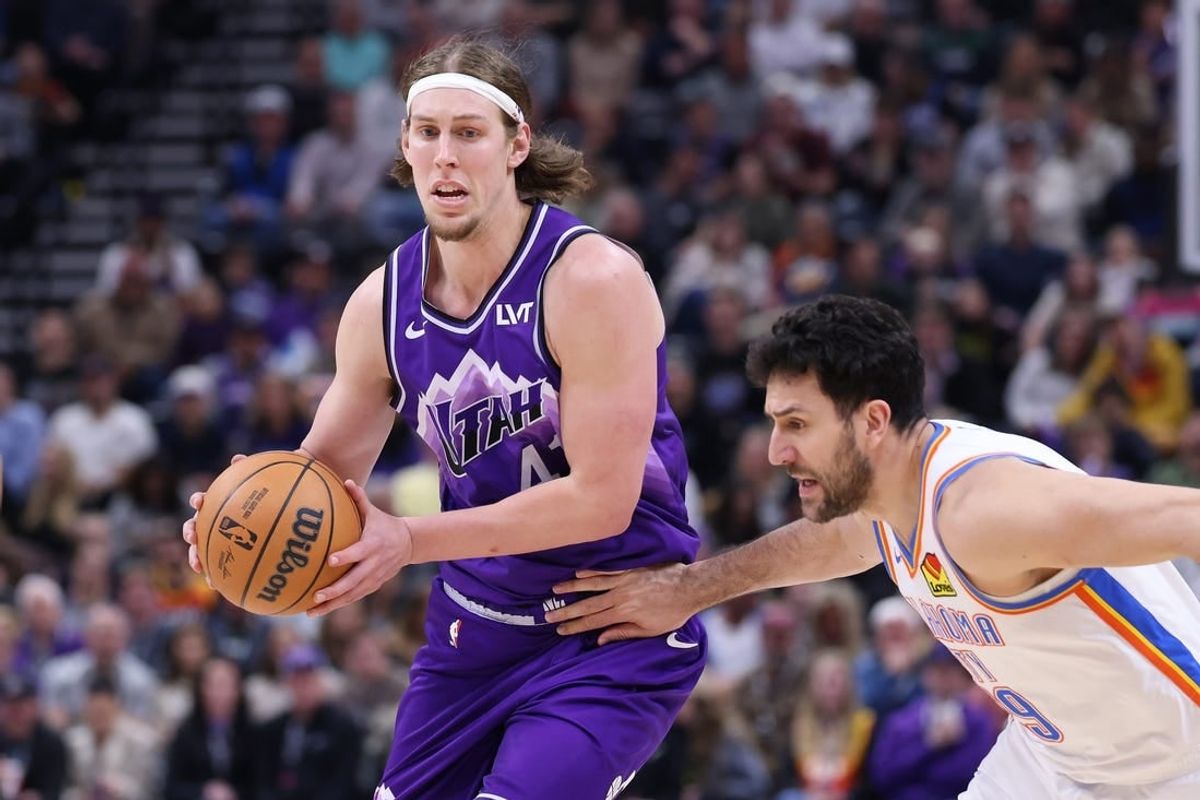 Feb 6, 2024; Salt Lake City, Utah, USA; Utah Jazz forward Kelly Olynyk (41) moves the ball against Oklahoma City Thunder guard Vasilije Micic (29) during the fourth quarter at Delta Center.