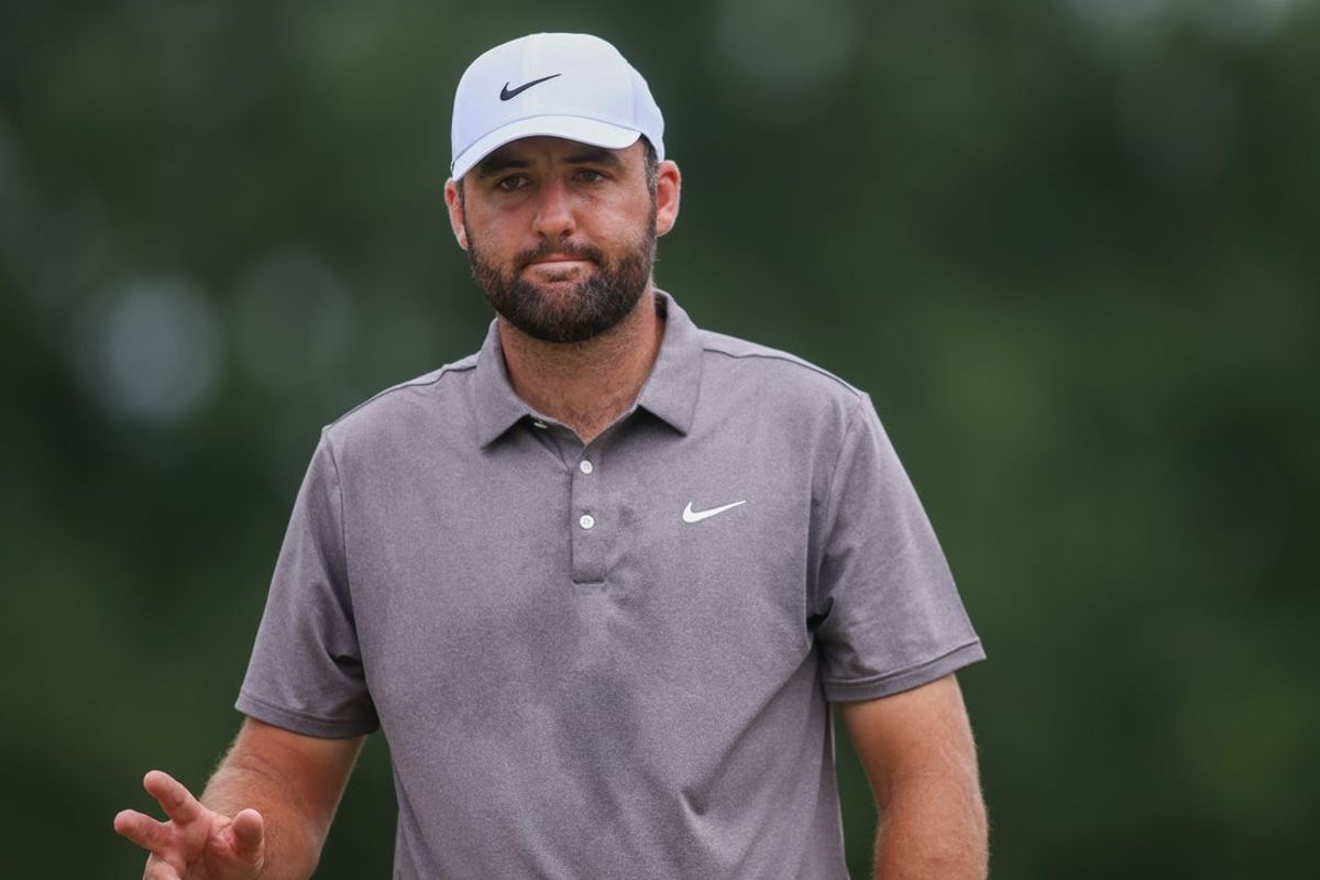 Aug 22, 2025; Atlanta, Georgia, USA; Scottie Scheffler reacts after a putt on the third green during the second round of the TOUR Championship golf tournament. Mandatory Credit: Brett Davis-Imagn Images