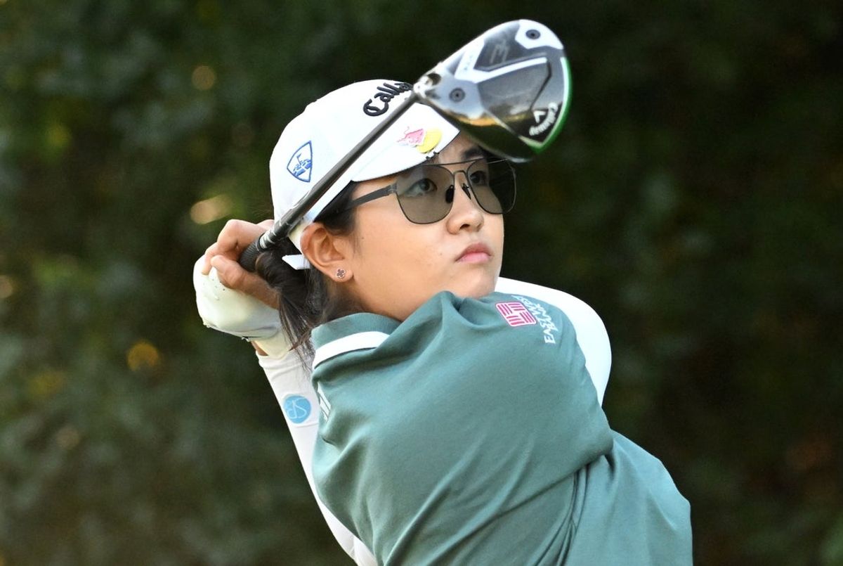Aug 22, 2025; Mississauga, Ontario, CAN;  Rose Zhang hits her tee shot at the fifth hole during second round play at the CPKC Women's Open golf tournament. Mandatory Credit: Dan Hamilton-Imagn Images
