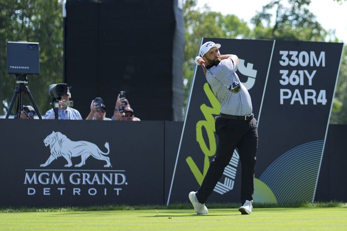 Aug 22, 2025; Detroit, Michigan, USA;  Jon Rahm of Legion XIII plays his shot from the second tee during the quarterfinals of the LIV Golf Michigan Team Championship at The Cardinal at Saint John's Resort. Mandatory Credit: Aaron Doster-Imagn Images