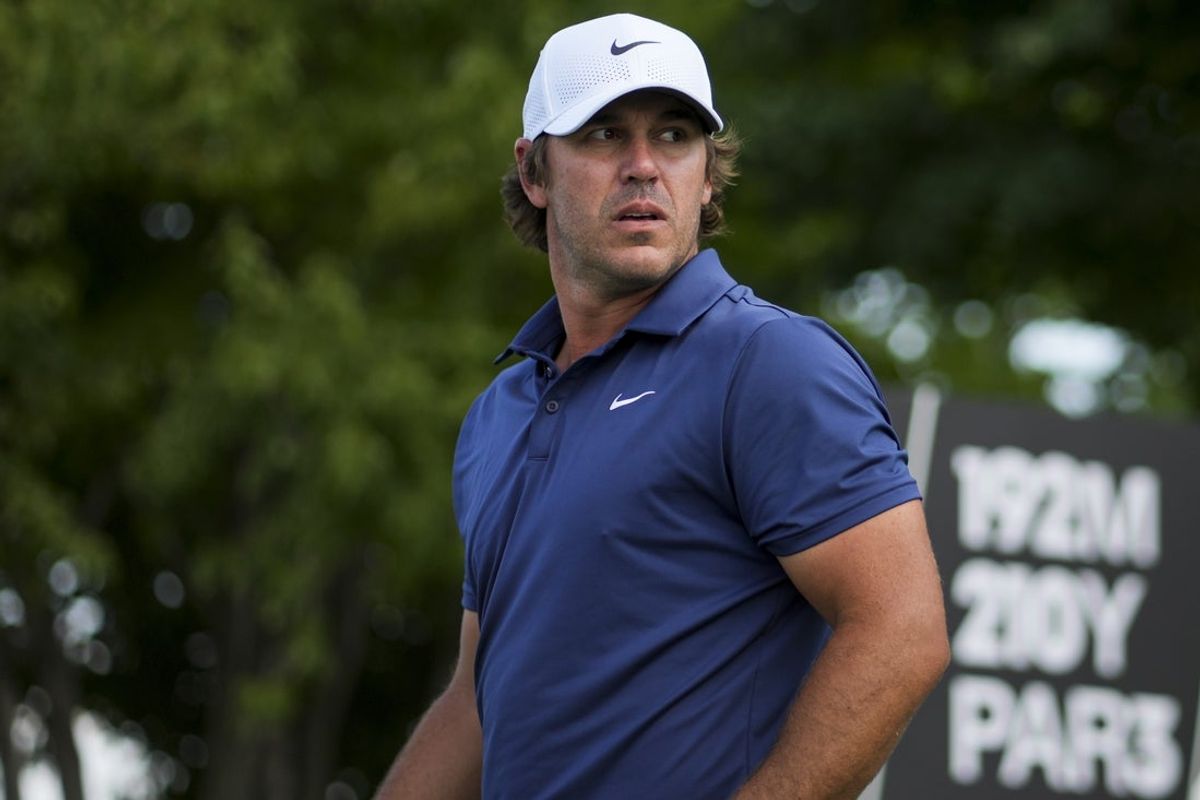 Aug 22, 2025; Detroit, Michigan, USA;  Brooks Koepka of Smash GC plays his shot from the third tee during the quarterfinals of the LIV Golf Michigan Team Championship at The Cardinal at Saint John's Resort. Mandatory Credit: Aaron Doster-Imagn Images