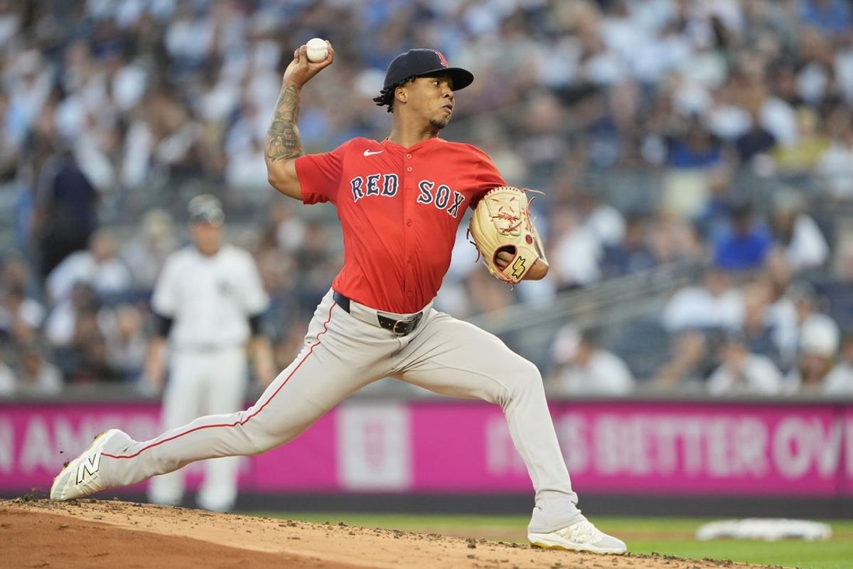 Aug 22, 2025; Bronx, New York, USA; Boston Red Sox pitcher Brayan Bello (66) delivers a pitch against the New York Yankees during the first inning at Yankee Stadium. Mandatory Credit: Gregory Fisher-Imagn Images
