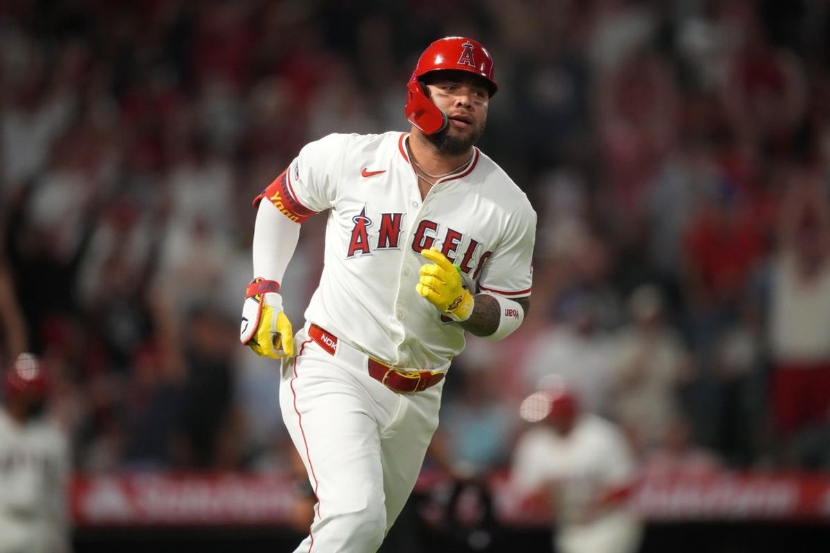 Aug 22, 2025; Anaheim, California, USA; Los Angeles Angels third baseman Yoan Moncada (5) runs the bases after hitting a home run in the seventh inning against the Chicago Cubs at Angel Stadium. Mandatory Credit: Kirby Lee-Imagn Images