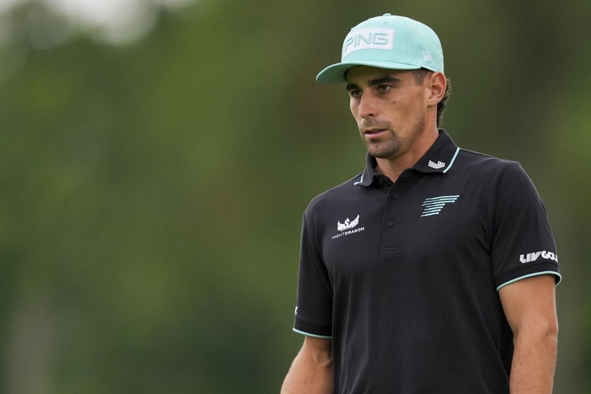 Aug 23, 2025; Detroit, Michigan, USA;  Joaquin Niemann of Torque GC walks the 14th fairway during the semifinals of the LIV Golf Michigan Team Championship at The Cardinal at Saint John's Resort. Mandatory Credit: Aaron Doster-Imagn Images