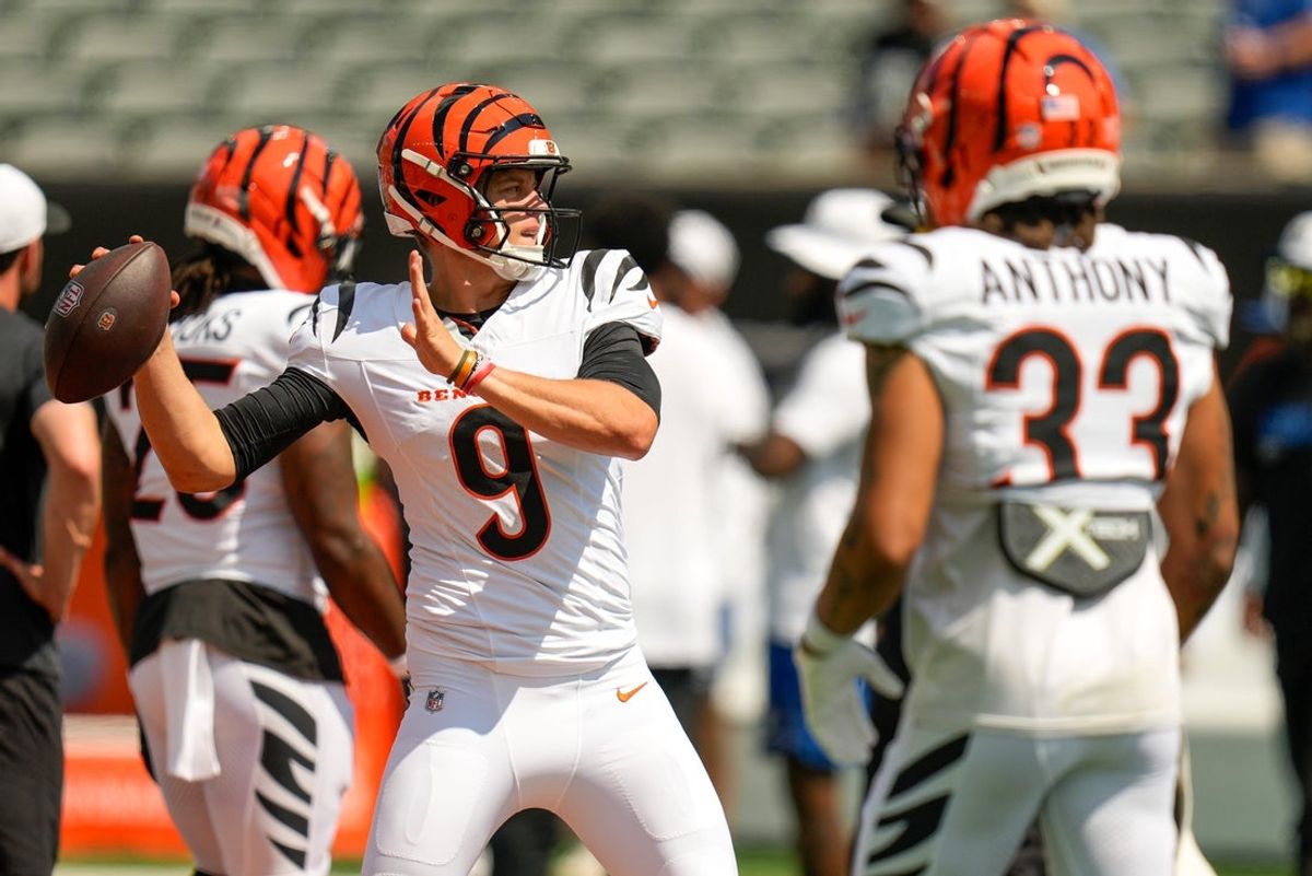 Cincinnati Bengals quarterback Joe Burrow (9) takes throws during pregame before the first quarter of the NFL Preseason Week 3 game between the Cincinnati Bengals and the Indianapolis Colts at Paycor Stadium in Cincinnati on Saturday, Aug. 23, 2025. The Colts led 24-7 at halftime.